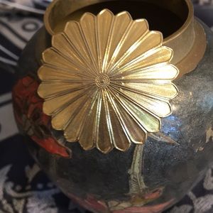 Golden tie clip with flower design